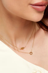 Gouden ketting met knoop